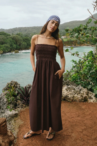 Model wearing Z Supply Cornelia Poplin Maxi Dress in Chocolate Cherry with a smocked bodice, square neckline, adjustable straps, and flowy cotton maxi skirt