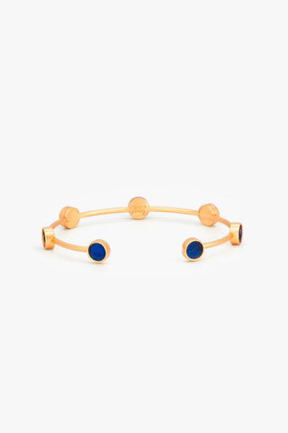 Brackish Deci Multi-Bezel cuff bracelet with blue peacock feather bezels and 18k gold plated finish
