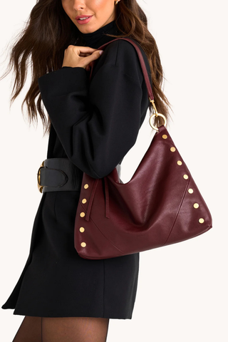 Hammitt Kyle Lrg Handbag in Cherrywood Pebble featuring deep oxblood pebbled leather, gold-tone rivets, and a slouchy hobo silhouette.