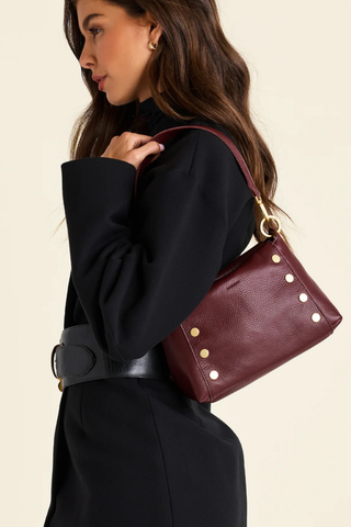 Hammitt Bryant Med Handbag in Cherrywood Pebble featuring oxblood pebbled leather, brushed gold hardware, and a structured shoulder bag silhouette.