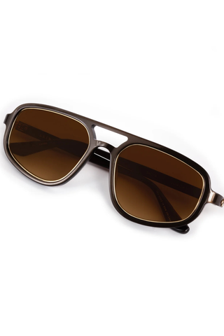 KREWE Jordan Sunglasses in Bronze Metallic + 12K featuring amber gradient lenses, glossy acetate frames, gold-plated hardware, and a modern aviator silhouette