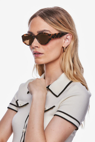 Krewe Lucy Sunglasses in Venezia featuring glossy tortoise acetate frames with amber lenses and a wraparound silhouette
