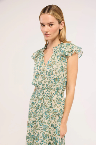 MISA Mariposa Dress in Azure Flora featuring blue floral chiffon, ruffle sleeves, smocked waist, and flowing handkerchief hem maxi dress