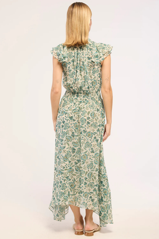 MISA Mariposa Dress in Azure Flora featuring blue floral chiffon, ruffle sleeves, smocked waist, and flowing handkerchief hem maxi dress