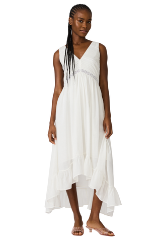 White cotton high-low maxi dress with lace trim, pintuck detailing, and open tie back by Steve Madden