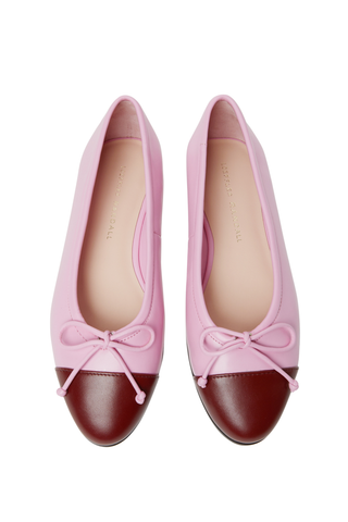 Loeffler Randall Noelle Flat in Candy Pink and Burgundy featuring a pink ballet flat silhouette, burgundy contrast toe, and bow detail.