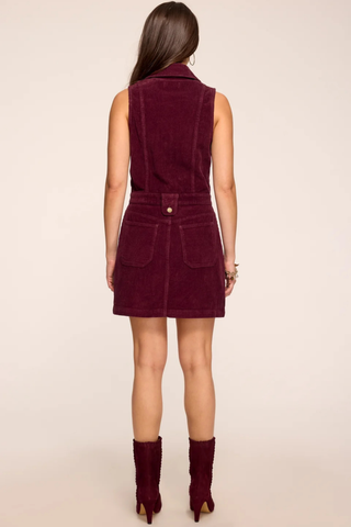 Ramy Brook Peyton Dress in Cranberry, a sleeveless cranberry corduroy mini dress with a point collar, gold-tone buttons, and patch pockets.