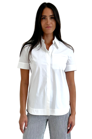 Woman wearing a white short-sleeve shirt on a white background