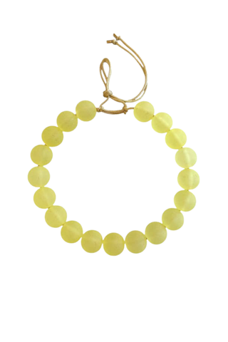 Chunky frosted yellow beaded necklace with gold clasp.