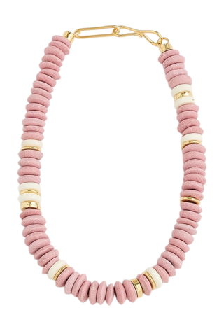 Light pink beaded necklace with gold accents.
