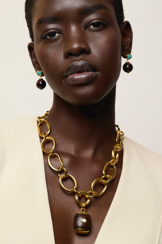 Lizzie Fortunato Beacon Charm Necklace in Acacia Wood featuring a gold-plated brass chain and mother-of-pearl detailed wood pendant.