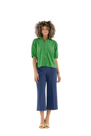 Emily McCarthy Bonny Top in Winter Pine featuring a vibrant green color, collared neckline, button front, and short puff sleeves.