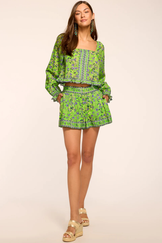 Bright lime floral mini shorts with elastic waist and pockets by Ramy Brook