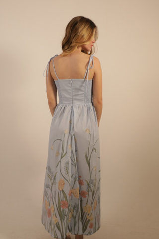 Blue midi dress with fitted bodice and floral border print skirt by Kleid