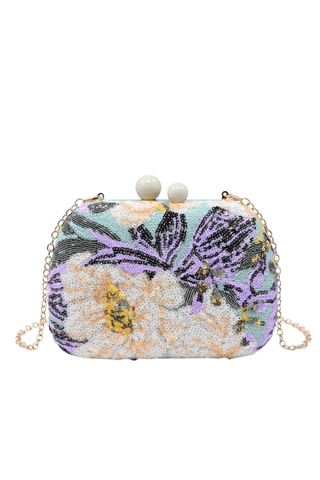 Rue Aveline Ryder evening bag with floral sequin embellishment, pearl clasp, and gold chain strap