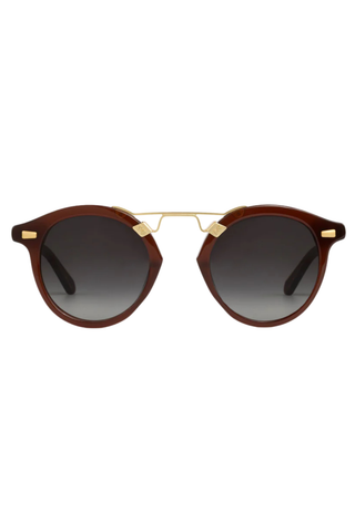 STL II Sunglasses in Espresso from Krewe, shown white background and modeled on female model.