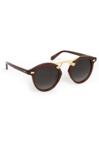 STL II Sunglasses in Espresso from Krewe, shown white background and modeled on female model.
