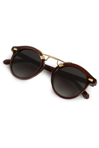 STL II Sunglasses in Espresso from Krewe, shown white background and modeled on female model.