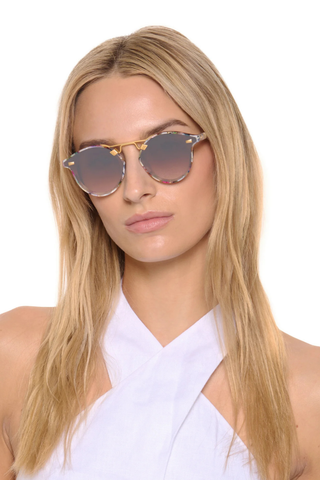 Krewe STL Nylon Sunglasses in Gelato with oversized rounded acetate frames, gold hardware, and amber mirrored lenses