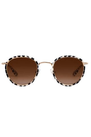 KREWE Tate Sunglasses in Domino 18K featuring round black-and-ivory acetate frames with amber gradient lenses and gold-plated hardware