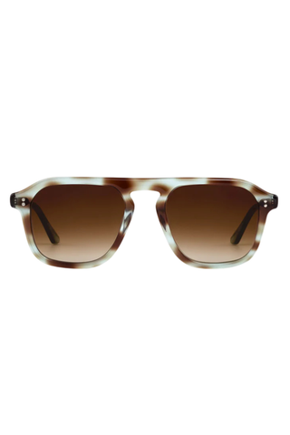 Zander Sunglasses in Aquamarine Tortoise from Krewe shown on a white background.